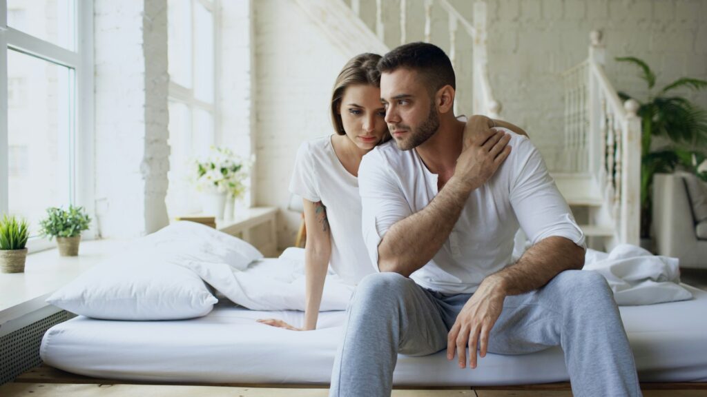 disconnected couple fighting on bed by vitaly gariev